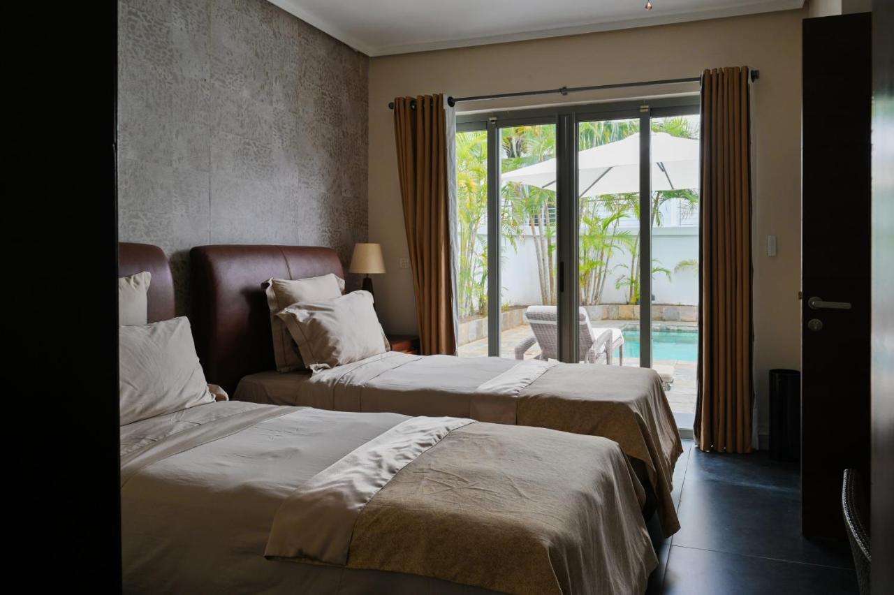 Villa Horizon By Dream Escapes, Beachfront Villa Pointe aux Canonniers Bagian luar foto